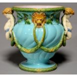 A Mintons spirally lobed ogee majolica jardiniere, c1870, with horn handle and applied with festoons