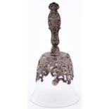 A Victorian silver mounted glass handbell, the die stamped openwork mount of flowers and trellis,