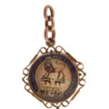 A Victorian reverse painted intaglio set 9ct gold watch fob pendant, with the head of a dog, 31mm,