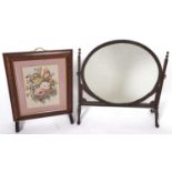 A Victorian carved mahogany dressing mirror with oval plate, 70cm w and a later firescreen with