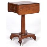 A Victorian mahogany drop leaf work table, fitted with two drawers on turned pillar and mahogany