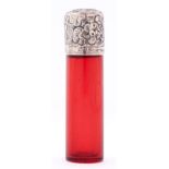 A Victorian silver mounted cylindrical ruby glass scent bottle, with embossed cap, 65mm h, maker's