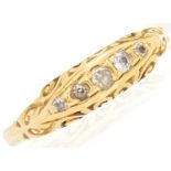 A five stone diamond ring, in gold marked 18, 3.6g, size M