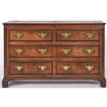 A George III oak Lancashire chest, with boarded hinge top, panelled sides on bracket feet, 92cm h;