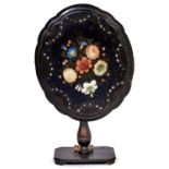 A Victorian black papier mache oval occasional table, c1870, the shaped top painted with colourful