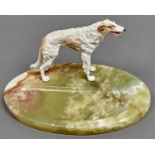 An Austrian  cold painted  bronze sculpture of a Borzoi,  on  oval onyx desk tray, c1930,  33cm l