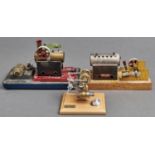 A Bohm Stirling model hot air engine, on varnished lightwood base, 12.5cm h and two Meccano