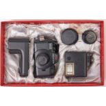 A Pentax Auto 110 Super Camera outfit, comprising Pentax Auto 110 Super Camera, Pentax-110 24mm F2.8