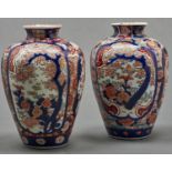 A pair of Japanese Imari shouldered oviform vases, early 20th c, 25cm h Handling wear to gilding