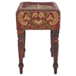 A Victorian mahogany stool, the rectangular top upholstered gros and petit pois, with figure and a