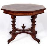 A walnut centre table, late 19th c, the butterfly veneered octagonal top with moulded lip, figured