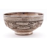A South East Asian cast and pierced silver dragons bowl, 20th c, with silver liner, the underside