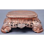 A Continental copper repousse stand, 18th / 19th c, the flat oblong top with egg and dart border,