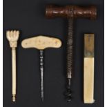 A Victorian brass mounted bone quill machine, a carved bone hand back scratcher, a bone handled