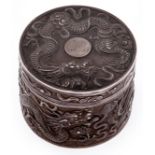 A Chinese round silver repousse dragons box and cover, c1908, the cover engraved with initial W