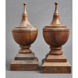 A pair of shield shaped oak finials, on stepped square chamfered base, 60cm h Minor shrinkage cracks