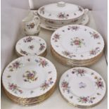 A Minton Marlow pattern part dinner service, printed with floral sprays, spiral fluted borders,