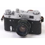 A Soviet Russian FED 3 35mm camera, with Jupiter-8 50mm F2 lens, front lens cap and body cap In