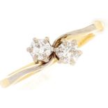 A diamond crossover ring, in gold marked 18ct, 2g, size K½