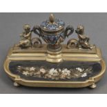 A French gilt brass champleve enamel and pietre dure inset inkstand, c1880, the shield shaped