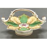 A miniature Staffordshire porcelain basket, c1820, in the form of eight apple green and primrose