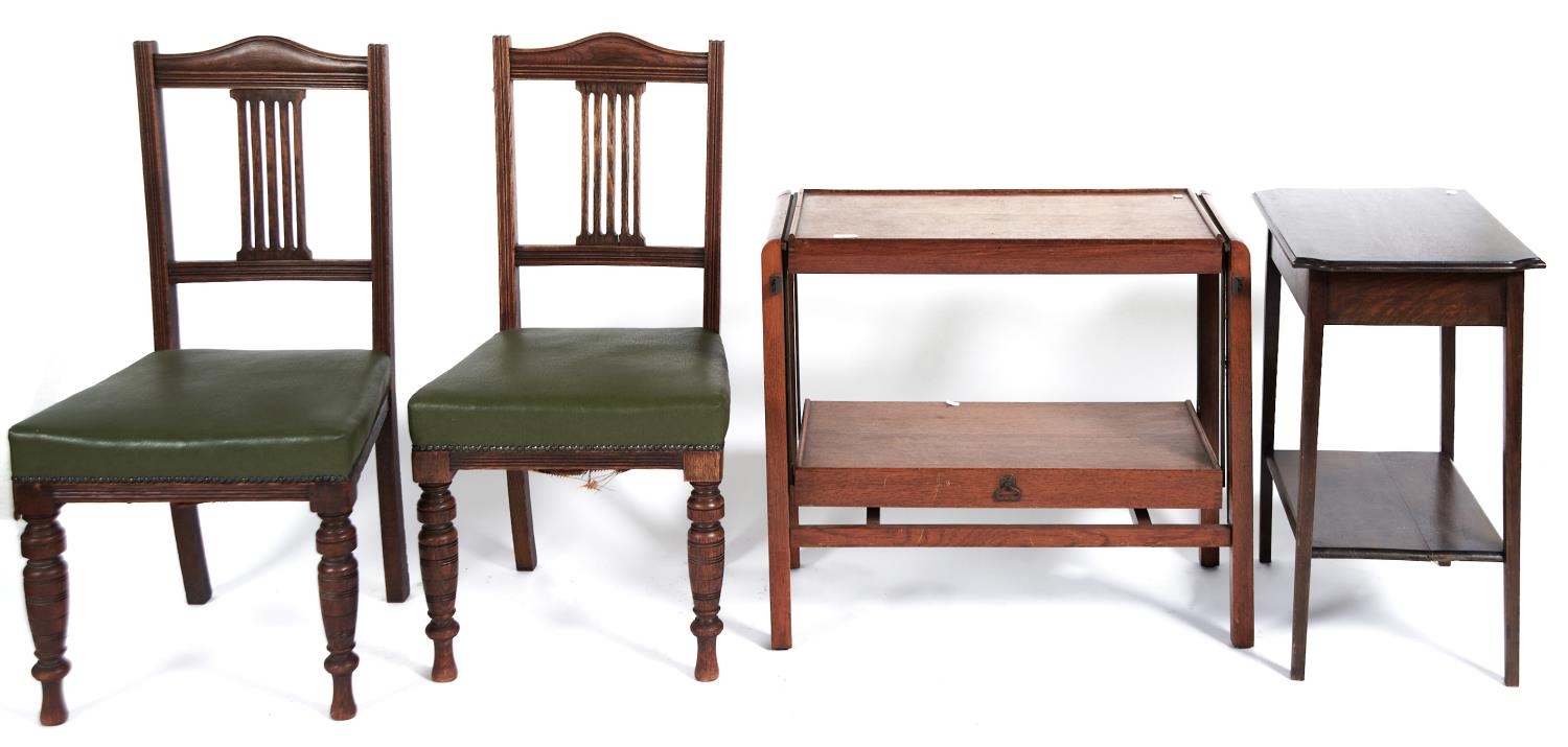 An oak folding two tier trolley, c1950, the upper and lower tier hinged to enable the lower tier