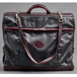 Luggage. A Mulberry black and burgundy leather suit carrier Slight wear