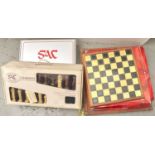A Sherlock Holmes chess set by The Traditional Games Company Ltd, boxed (2), another chess set of