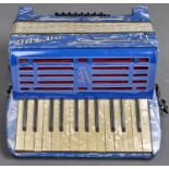A Pietro cased piano accordion, c1960's, 36cm w Strap worn and damaged, numerous scuffs, scratches