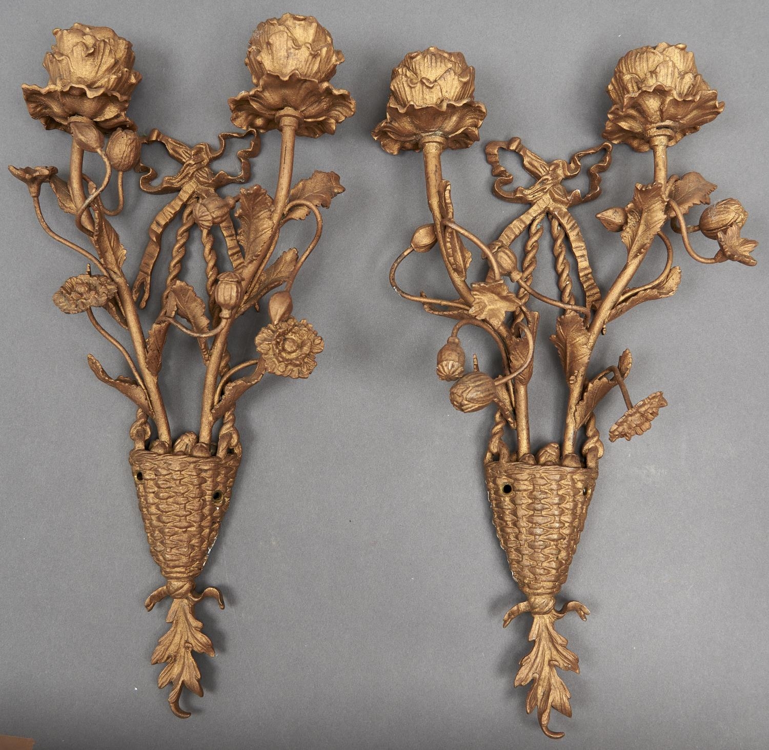 A pair of giltmetal wall lights, c1900, in the form of two leafy naturalistic sconces issuing from a