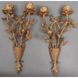 A pair of giltmetal wall lights, c1900, in the form of two leafy naturalistic sconces issuing from a