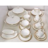A Minton Horizon pattern part breakfast service, comprising six two handled soup bowls on stands,