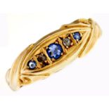 An Edwardian five stone sapphire and diamond ring, in 18ct gold, Chester 1904, 2g, size L½ Good