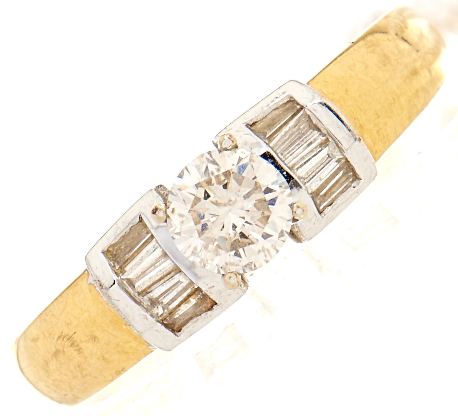 A zircon and diamond ring, in gold marked 18k, J/K and I colour, 4.5g, size Q½