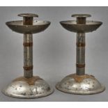 A pair of pewter and brass candlesticks, early 20th c, of riveted construction on domed foot, 19cm