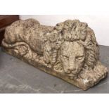 A pair of reconstituted stone lion garden ornaments, late 20th c, 110cm l approximately