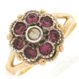 A paste cluster ring,  in gold marked 750, 3.6g, size L