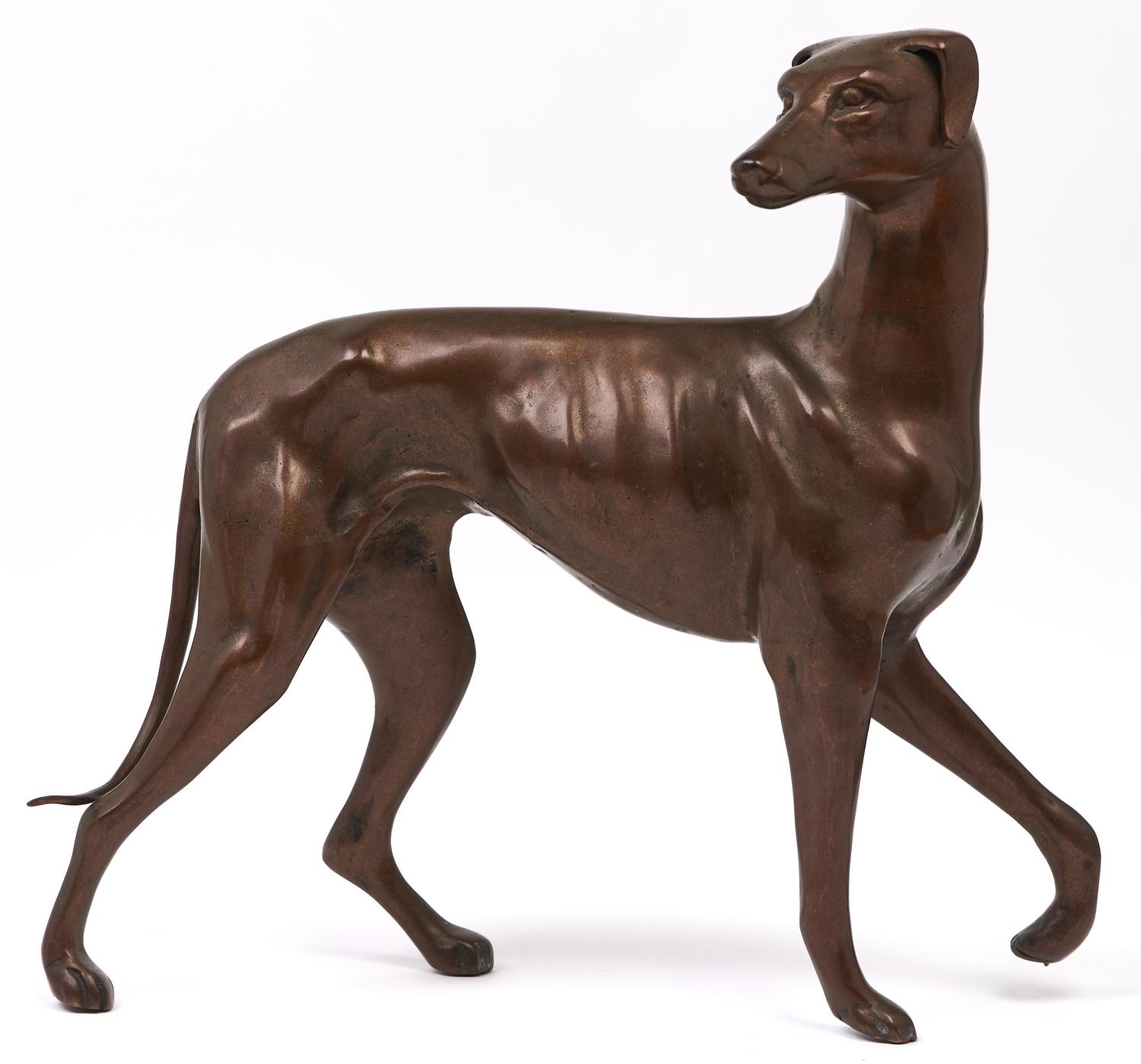 A bronze sculpture of a Greyhound, 41.5cm l, 38cm h Good condition