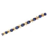 A gold diamond and sapphire bracelet, marked 18c, 13.5g