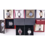 Nine various lady's and gentleman's fashion watches, boxed / cased Mostly as new