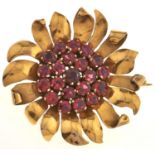 A ruby sunflower brooch, in gold, 40mm, 13g Slightly scratched from wear