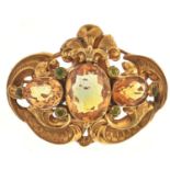 A Victorian citrine and peridot brooch, c1860, in gold, 41mm, 8.9g Slight faults and wear consistent