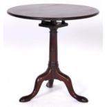 A George III mahogany tripod table, the tilt top with birdcage action, 75cm diam Solid on legs,