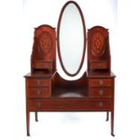 An Edwardian mahogany dressing table, c1905, the super structure with pair of inlaid ovals and short