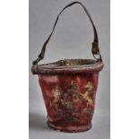 A red painted leather fire bucket, early 20th c, with coloured transfer of the royal arms of the