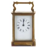 A French brass carriage timepiece, Richard et Cie, Paris, swing carrying handle, white enamel dual
