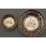 A Minton cobalt ground saucer and a matching Staffordshire dish, c1815, painted with flowers and a