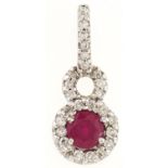 A 14ct white gold, ruby and diamond pendant, 2.4g