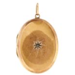 An oval gold locket, gypsy set with chip diamond, 5.6g