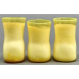 A set of three semi opalescent primrose glass beaker shaped vases, 20th c, sealed Good condition